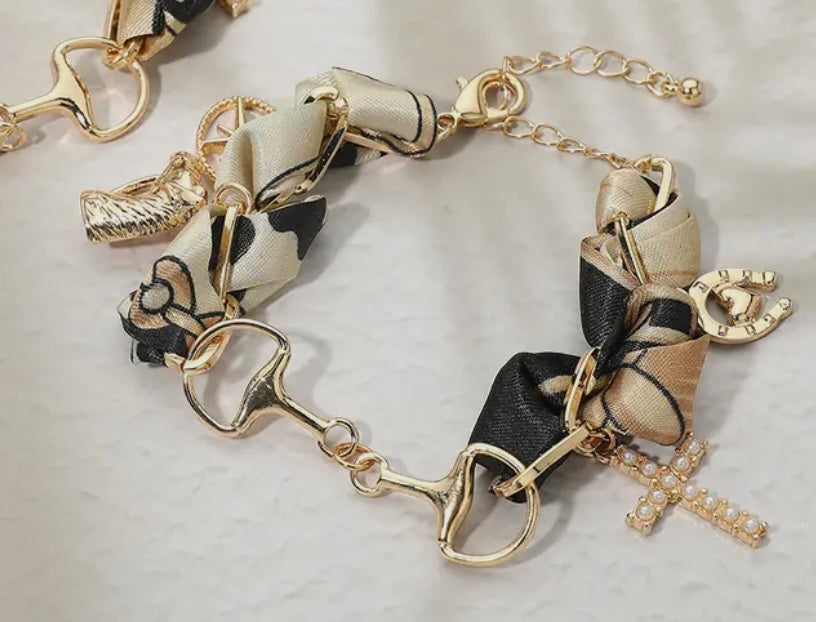 Gold and Black Horsebit Charm Bracelet