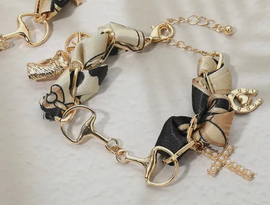 Gold and Black Horsebit Charm Bracelet